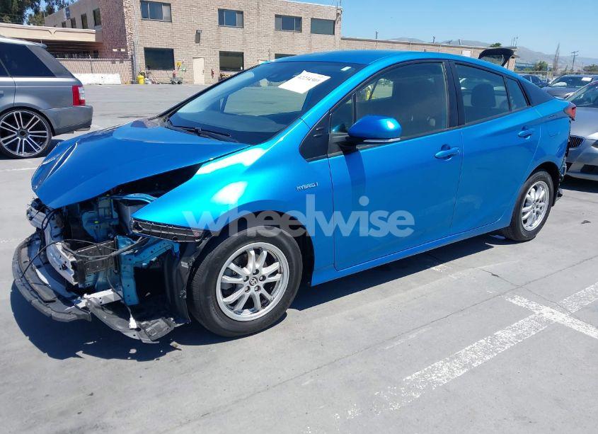 Photo 2 of 2022 Toyota Prius LE (VIN JTDKAMFU1N3164838)