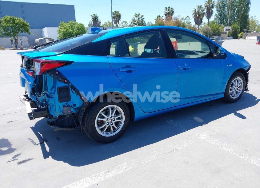 Photo 4 of 2022 Toyota Prius LE (VIN JTDKAMFU1N3164838)