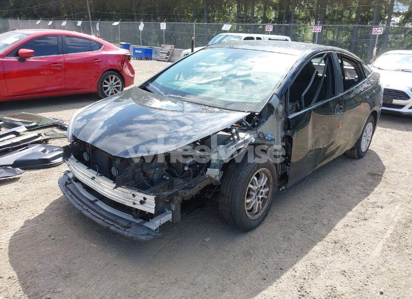 Photo 2 of 2021 Toyota Prius L ECO (VIN JTDKAMFU3M3140233)