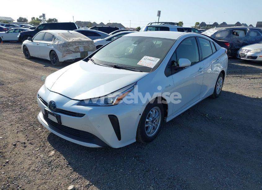 Photo 2 of 2021 Toyota Prius LE (VIN JTDKAMFU5M3142159)