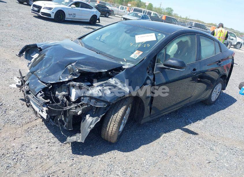 Photo 2 of 2021 Toyota Prius LE (VIN JTDKAMFU6M3150237)