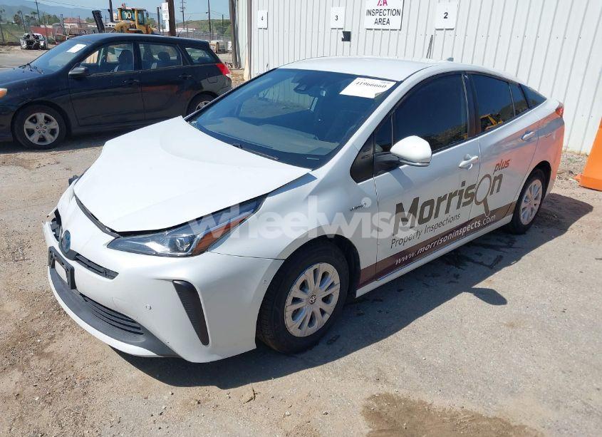 Photo 2 of 2021 Toyota Prius LE (VIN JTDKAMFU8M3133925)