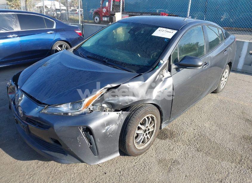Photo 2 of 2022 Toyota Prius L (VIN JTDKAMFUXN3188930)