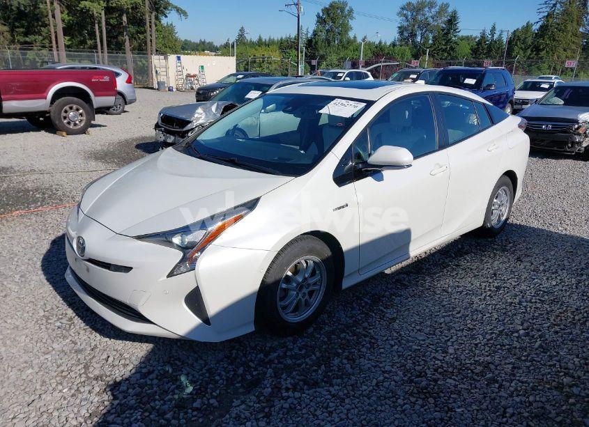 Photo 2 of 2017 Toyota Prius FOUR (VIN JTDKARFU1H3033538)
