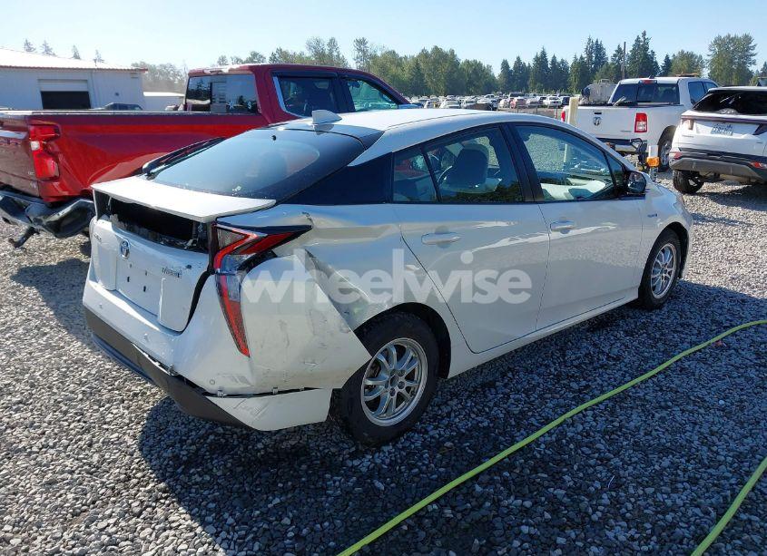 Photo 4 of 2017 Toyota Prius FOUR (VIN JTDKARFU1H3033538)