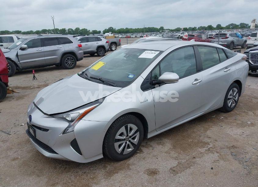 Photo 2 of 2017 Toyota Prius FOUR (VIN JTDKARFU1H3044393)