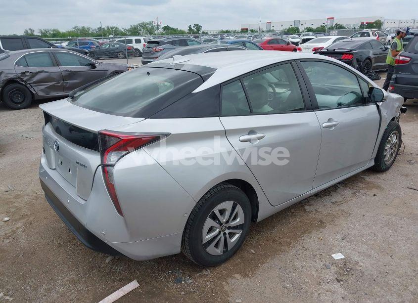Photo 4 of 2017 Toyota Prius FOUR (VIN JTDKARFU1H3044393)