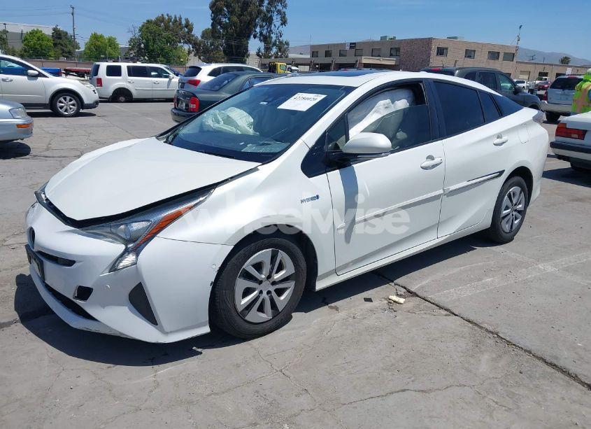 Photo 2 of 2018 Toyota Prius FOUR (VIN JTDKARFU8J3054828)