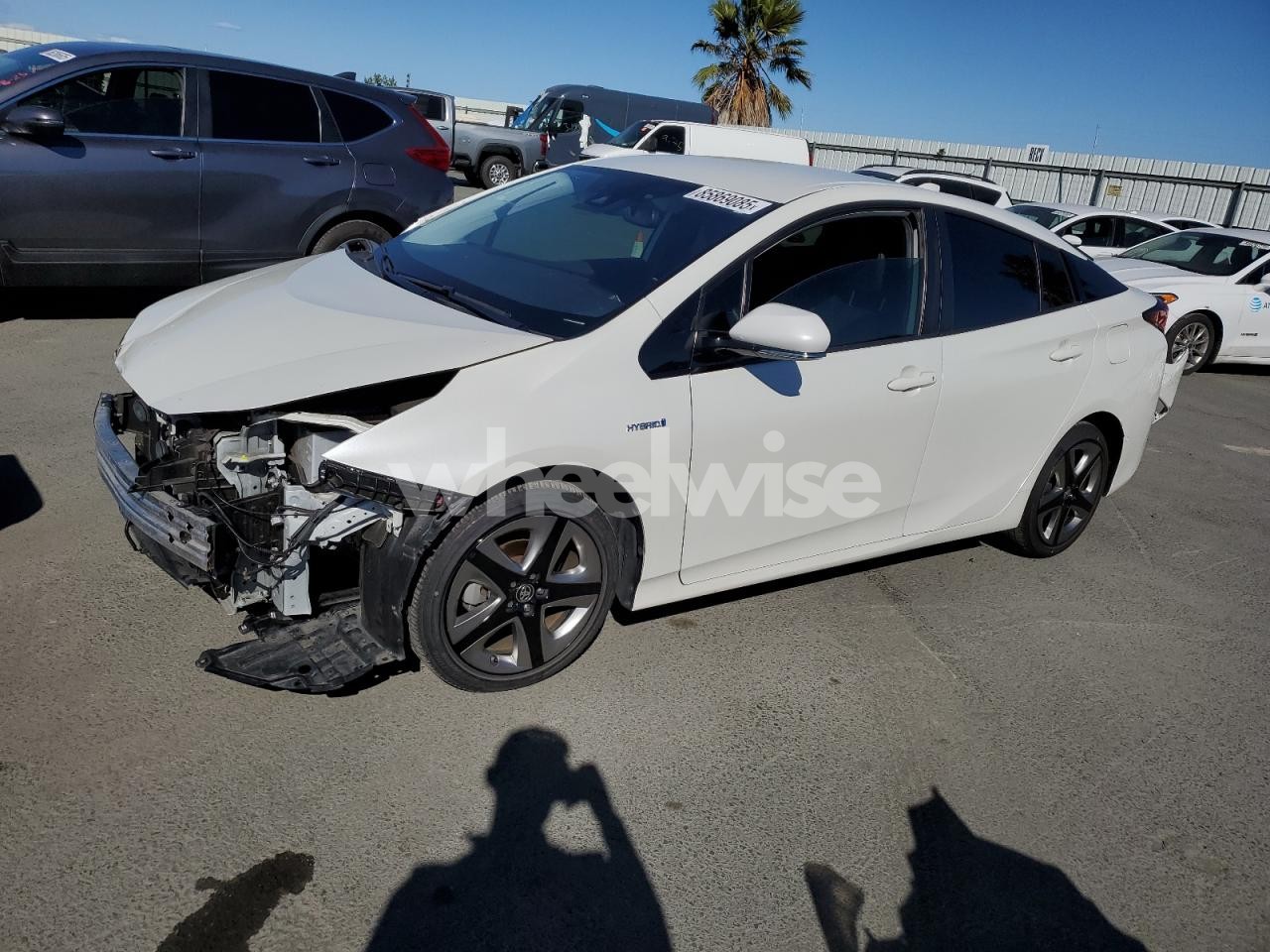 2020 TOYOTA PRIUS L (VIN JTDKARFU8L3111418) main photo