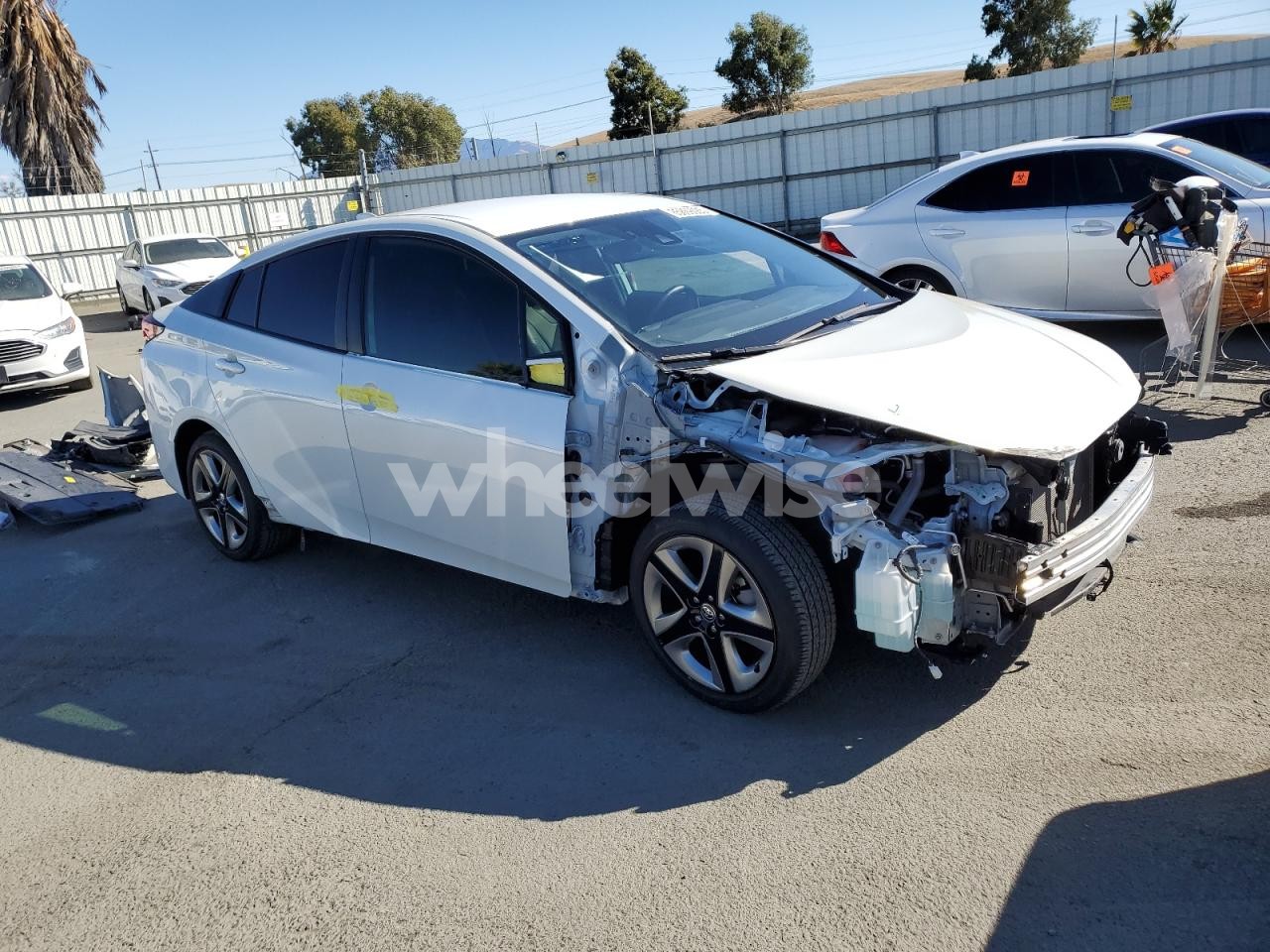 Photo 4 of 2020 TOYOTA PRIUS L (VIN JTDKARFU8L3111418)