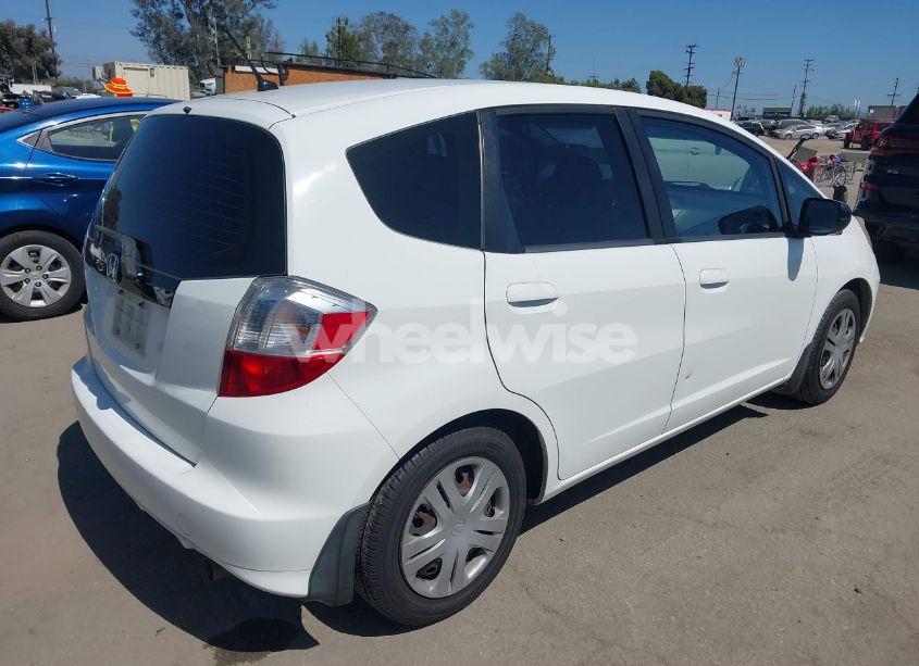 Photo 4 of 2011 Honda Fit (VIN JTDKB20U587******)