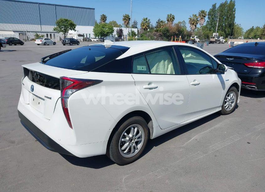 Photo 4 of 2018 Toyota Prius (VIN JTDKBRFU9J3063860)