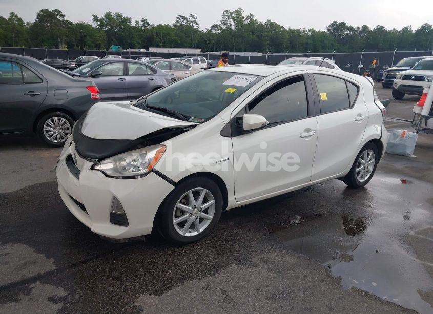 Photo 2 of 2013 Toyota Prius C THREE (VIN JTDKDTB39D1556152)