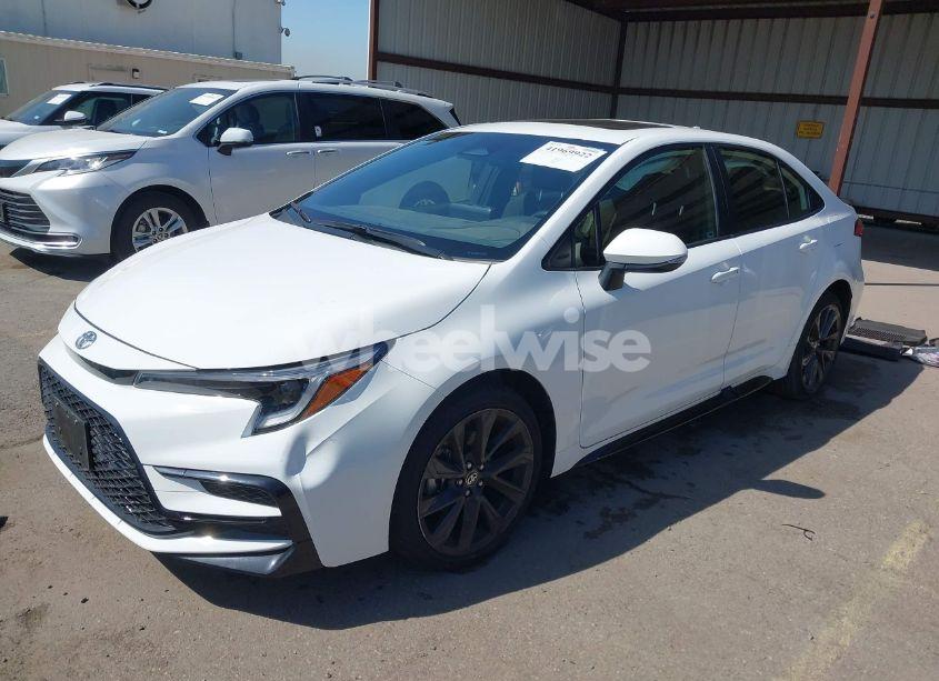 Photo 2 of 2024 Toyota Corolla SE (VIN JTDP4MCE3RJ104653)