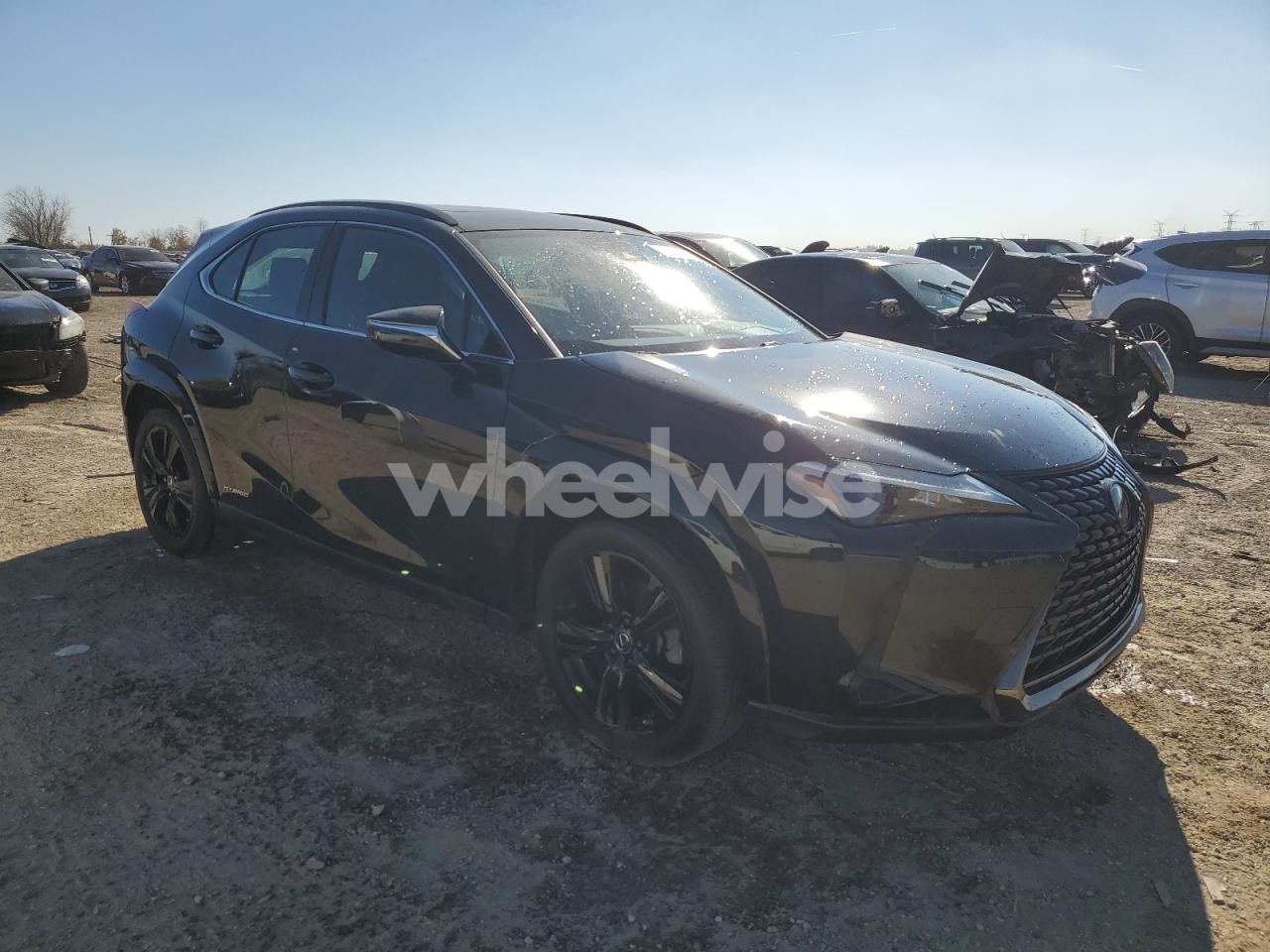 Photo 4 of 2021 LEXUS UX 250H N/A (VIN JTHP9JBH4M2047344)