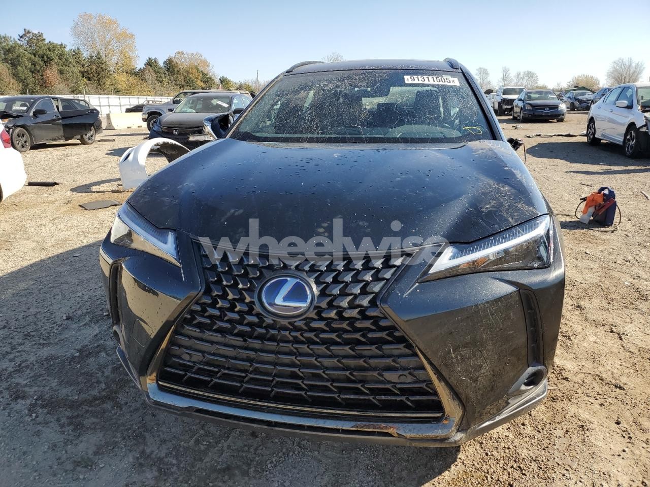 Photo 5 of 2021 LEXUS UX 250H N/A (VIN JTHP9JBH4M2047344)