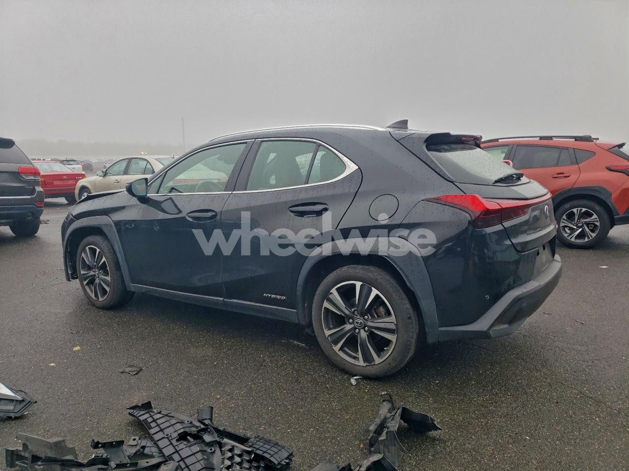 Photo 2 of 2021 LEXUS UX 250H (VIN JTHP9JBH9M2038591)