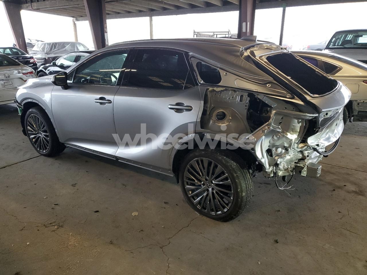 Photo 2 of 2024 LEXUS RX 450H+ LUXURY (VIN JTJCJMGA9R2020648)