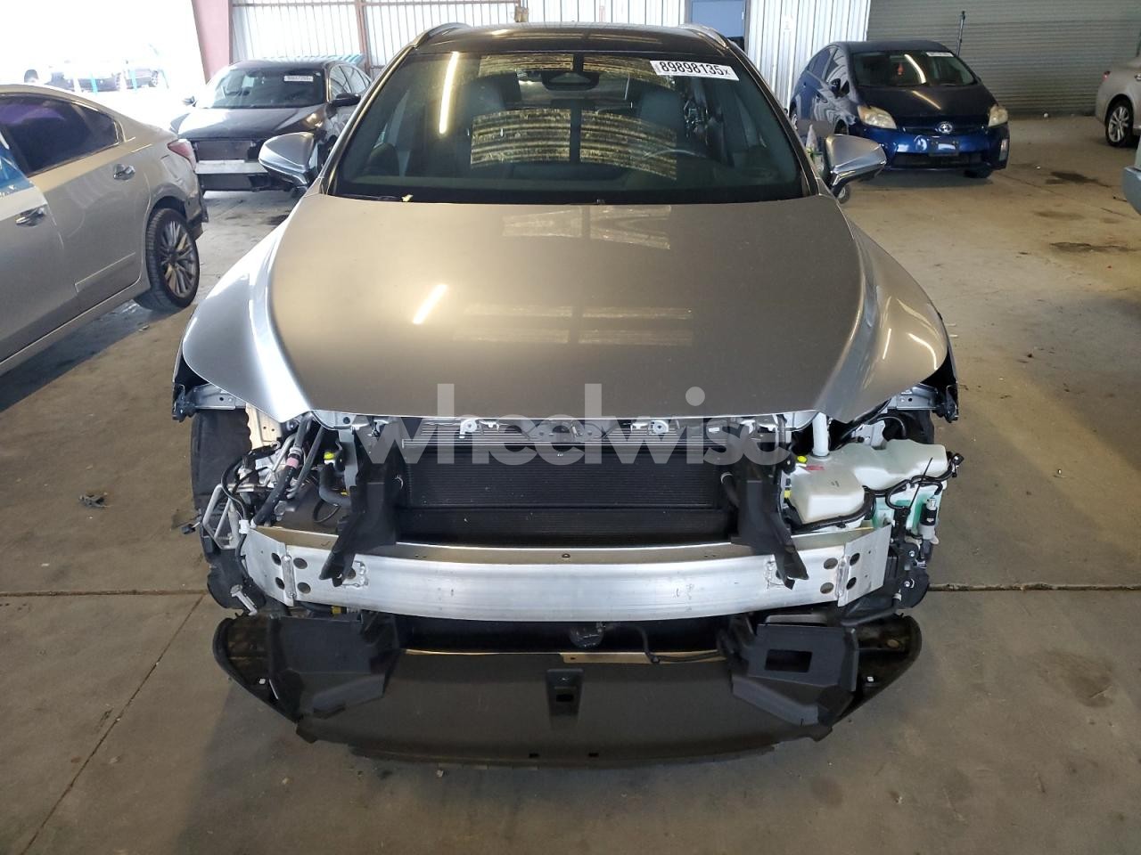 Photo 5 of 2024 LEXUS RX 450H+ LUXURY (VIN JTJCJMGA9R2020648)