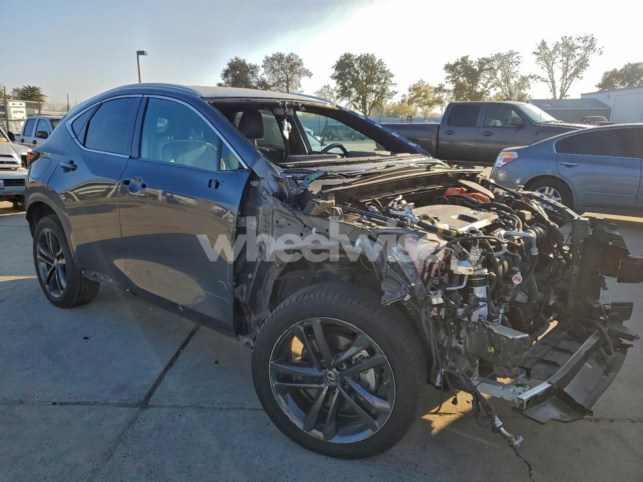 Photo 4 of 2023 LEXUS NX 450H (VIN JTJHKCFZ7P2012565)