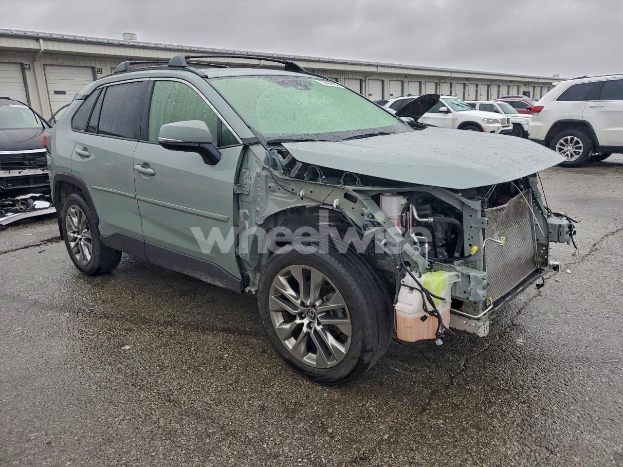 Photo 4 of 2022 TOYOTA RAV4 XLE PREMIUM (VIN JTMA1RFV8ND086246)