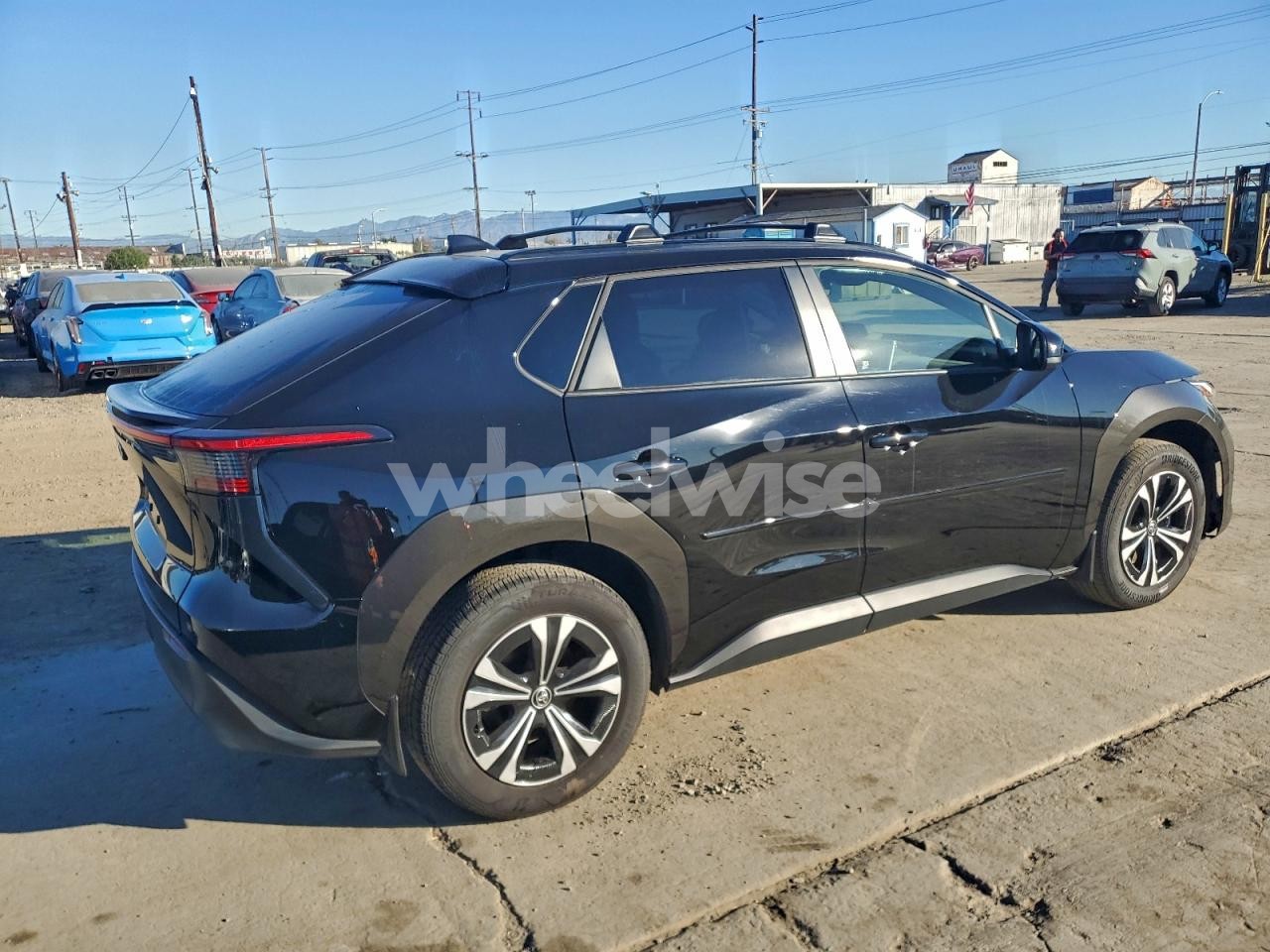 Photo 3 of 2024 TOYOTA BZ4X XLE (VIN JTMAAAAA5RA054545)