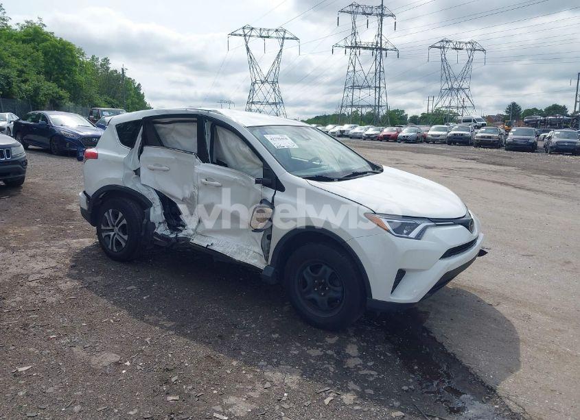 2018 Toyota Rav4 LE (VIN JTMBFREV4JJ193636) main photo