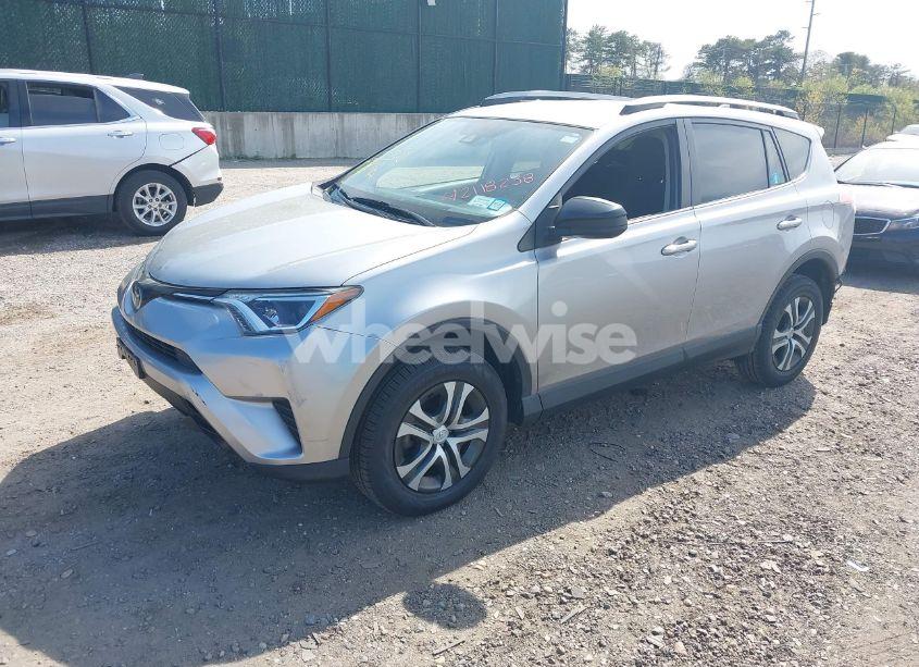 Photo 2 of 2018 Toyota Rav4 LE (VIN JTMBFREV5JD246228)