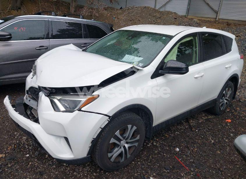 Photo 2 of 2018 Toyota Rav4 LE (VIN JTMBFREV5JJ727985)