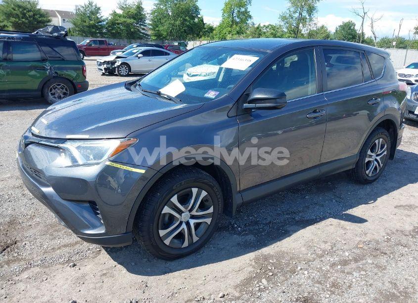 Photo 2 of 2018 Toyota Rav4 LE (VIN JTMBFREVXJJ730283)