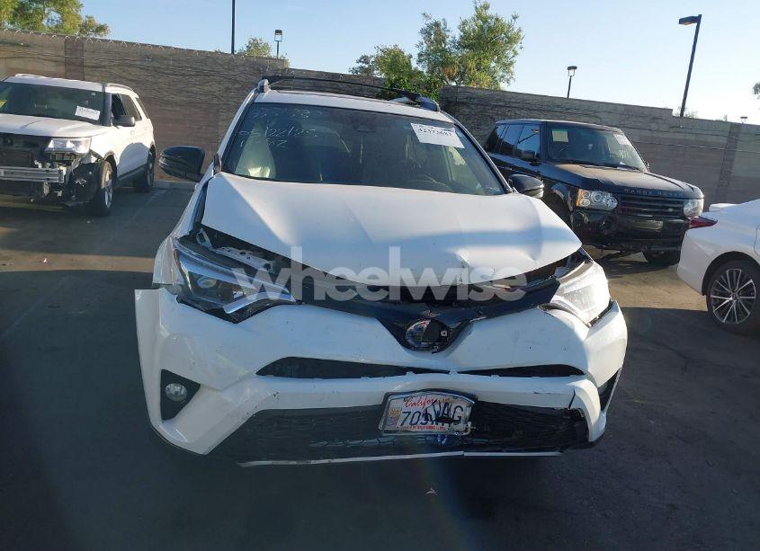 Photo 12 of 2018 Toyota Rav4 HYBRID SE (VIN JTMJJREVXJD228530)