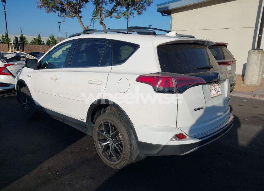 Photo 3 of 2018 Toyota Rav4 HYBRID SE (VIN JTMJJREVXJD228530)