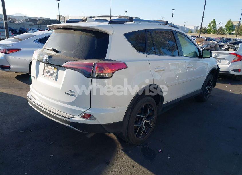 Photo 4 of 2018 Toyota Rav4 HYBRID SE (VIN JTMJJREVXJD228530)