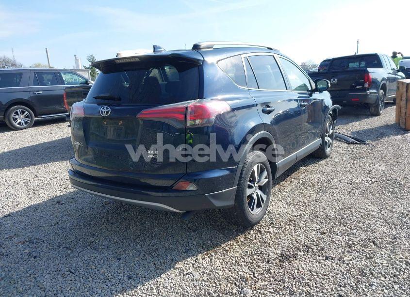 Photo 4 of 2018 Toyota Rav4 XLE (VIN JTMRFREV1JJ180499)