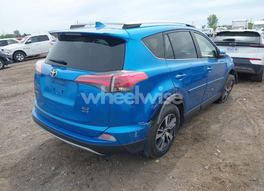 Photo 4 of 2018 Toyota Rav4 XLE (VIN JTMRFREV2JJ206592)