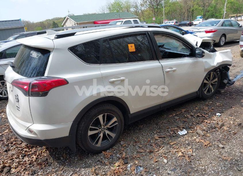 Photo 4 of 2018 Toyota Rav4 XLE (VIN JTMRFREV4JJ744971)