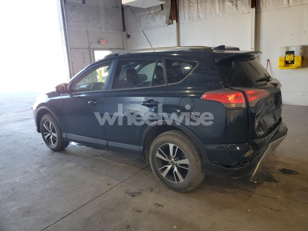 Photo 2 of 2017 TOYOTA RAV4 XLE (VIN JTMRFREV9HJ110081)