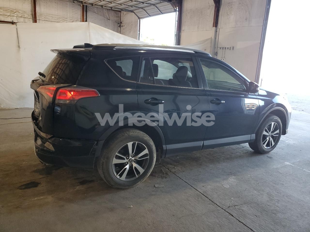 Photo 3 of 2017 TOYOTA RAV4 XLE (VIN JTMRFREV9HJ110081)