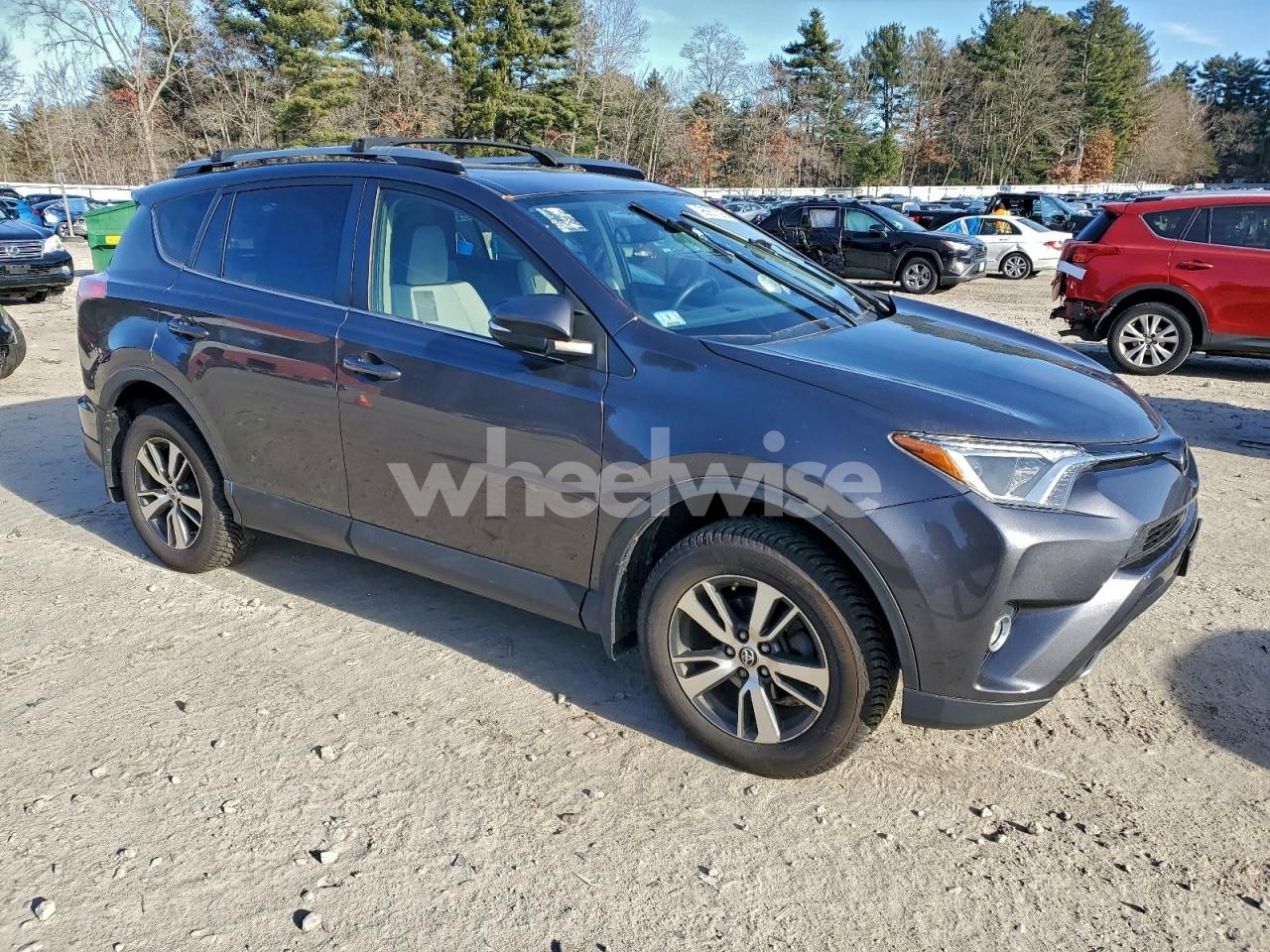 Photo 4 of 2017 TOYOTA RAV4 XLE (VIN JTMRFREV9HJ165758)