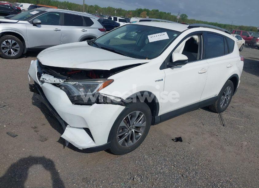 Photo 2 of 2018 Toyota Rav4 HYBRID LE (VIN JTMRJREV4JD180509)