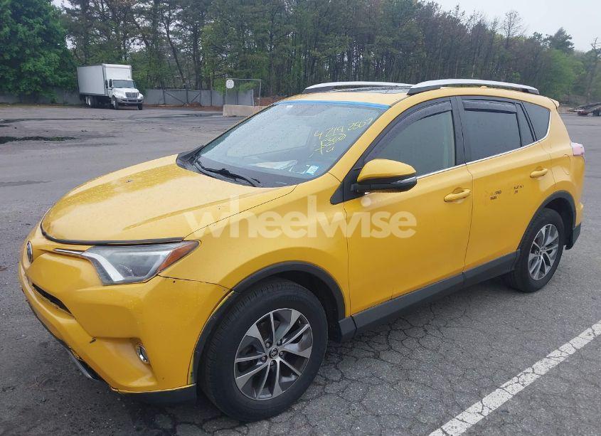 Photo 2 of 2016 Toyota Rav4 HYBRID XLE (VIN JTMRJREV5GD025993)