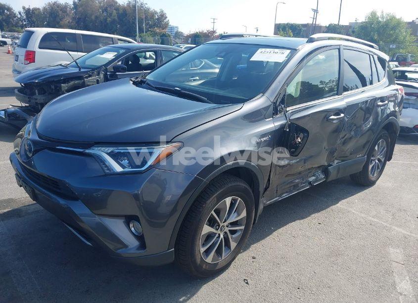 Photo 2 of 2018 Toyota Rav4 HYBRID XLE (VIN JTMRJREV5JD240054)