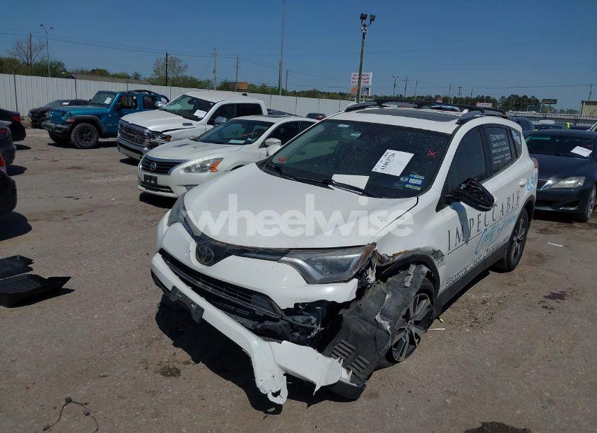 Photo 2 of 2017 Toyota Rav4 XLE (VIN JTMWFREVXHJ705220)