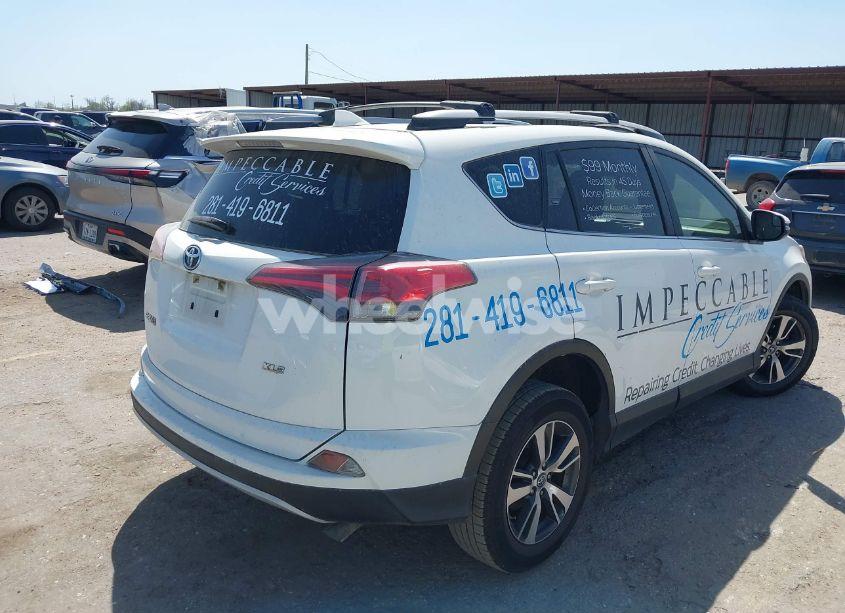 Photo 4 of 2017 Toyota Rav4 XLE (VIN JTMWFREVXHJ705220)