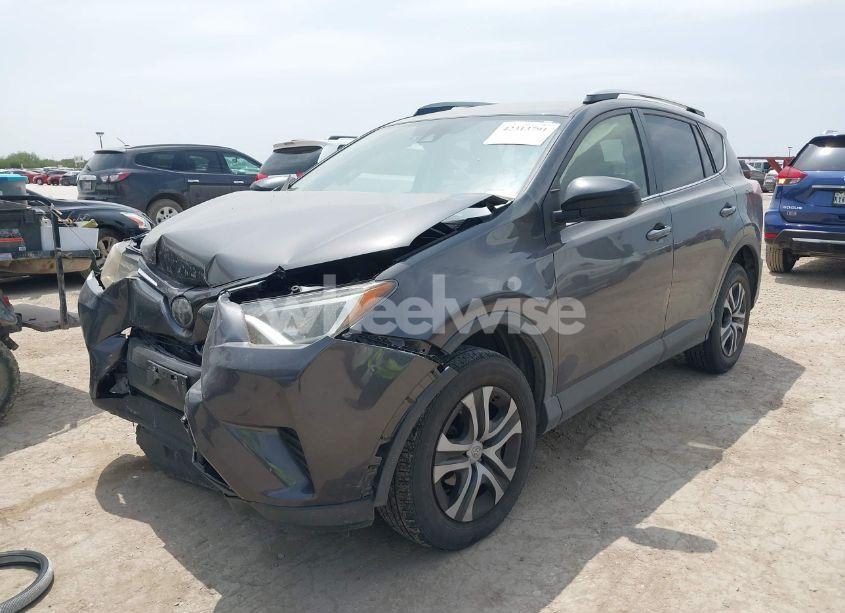Photo 2 of 2018 Toyota Rav4 LE (VIN JTMZFREV0JJ211371)