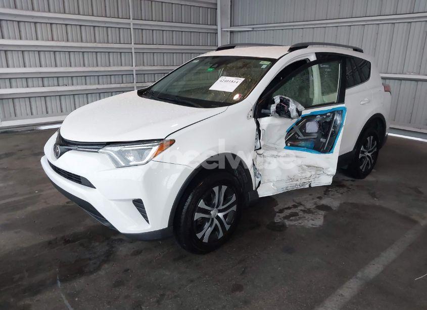 Photo 2 of 2018 Toyota Rav4 LE (VIN JTMZFREV1JD130846)