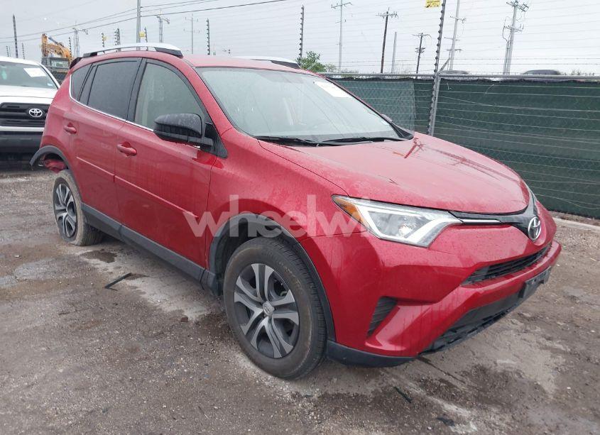 2016 Toyota Rav4 LE (VIN JTMZFREV2GJ100524) main photo