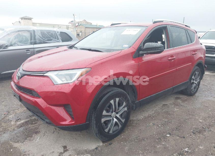 Photo 2 of 2016 Toyota Rav4 LE (VIN JTMZFREV2GJ100524)