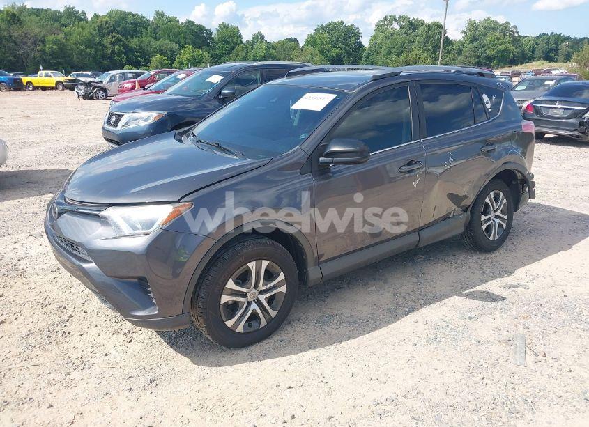 Photo 2 of 2017 Toyota Rav4 LE (VIN JTMZFREV7HJ138591)