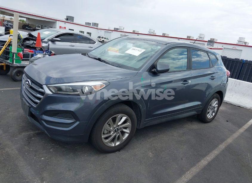 Photo 2 of 2017 Hyundai Tucson SE (VIN KM8J23A41HU423462)